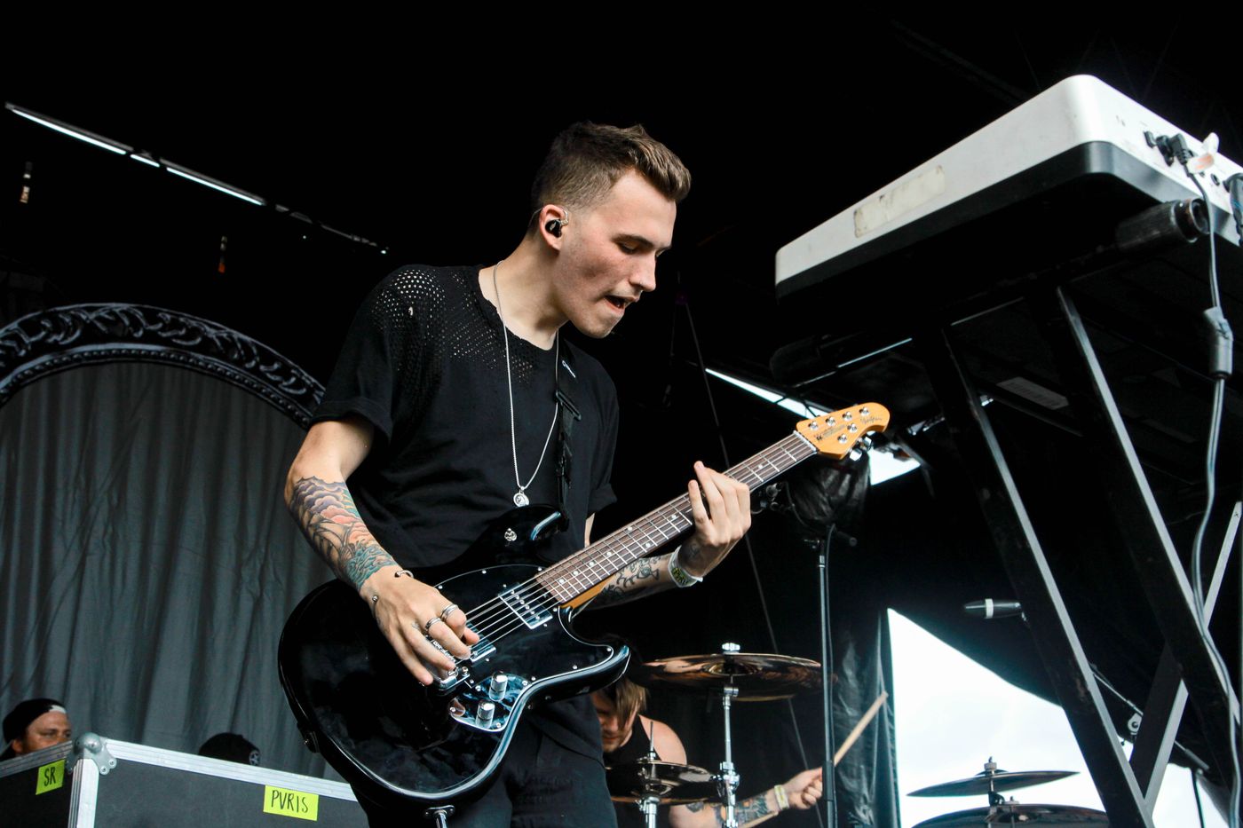 Alex from PVRIS Playing An Ernie Ball Music Man StingRay Guitar
