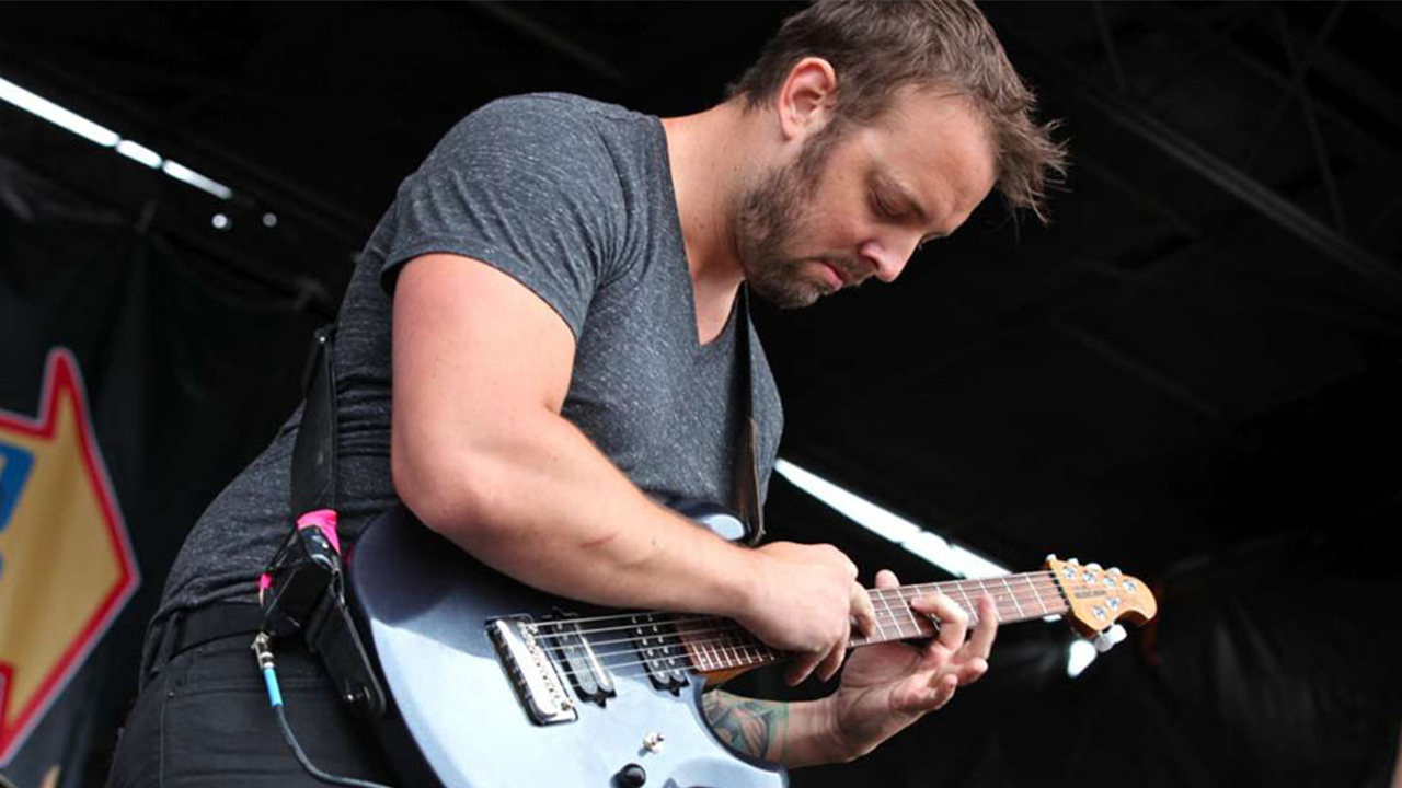 Shane Blay of Oh, Sleeper's Ernie Ball Music Man Instrument Collection